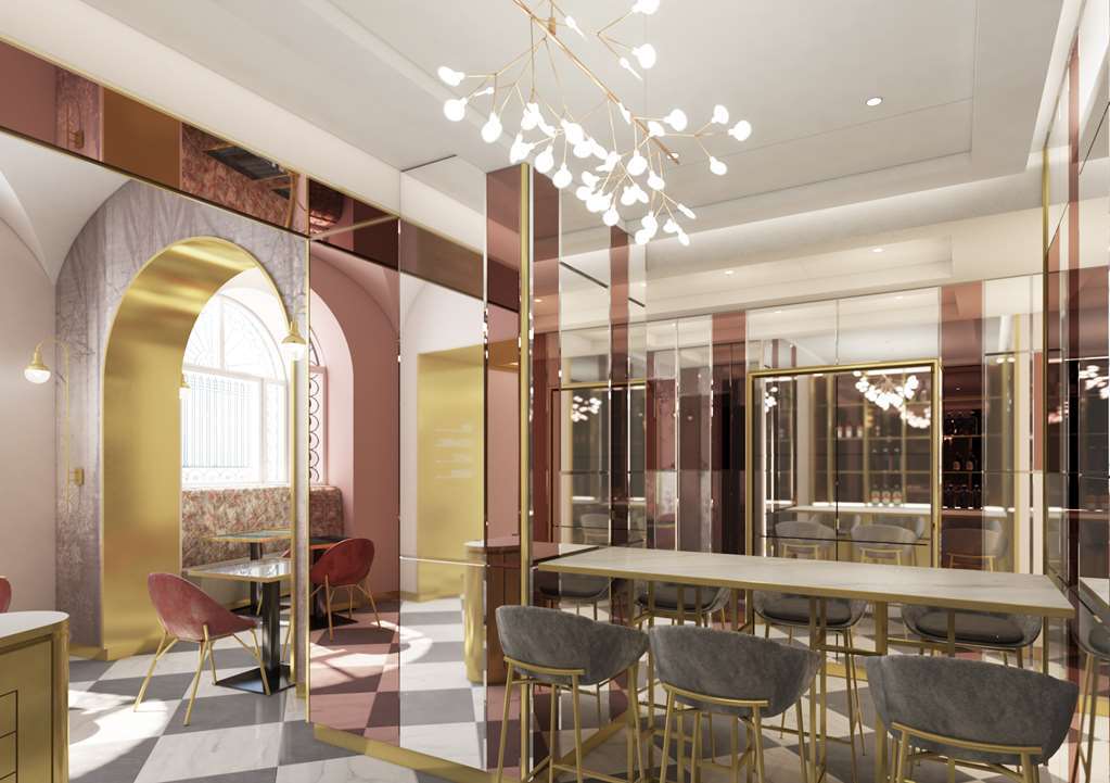 Hotel Nh Collection Roma Fori Imperiali Restaurante foto The interior of the new station